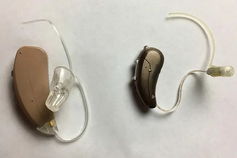 Behind-the-ear models, such as the Siemens Carat (right) and the MDHearing Aid Volt, are the most popular type.