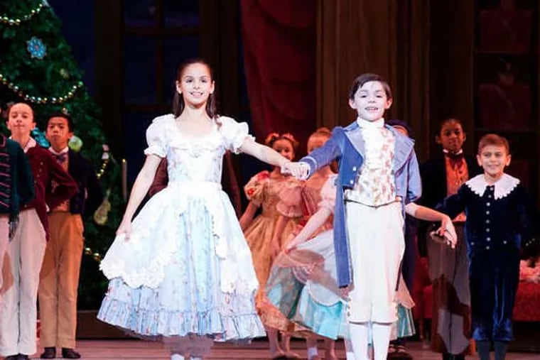 Abbie Rorke and Aidan Duffy with students of The School of Pennsylvania Ballet in George Balanchine’s The Nutcracker™
Photo: Alexander Iziliaev