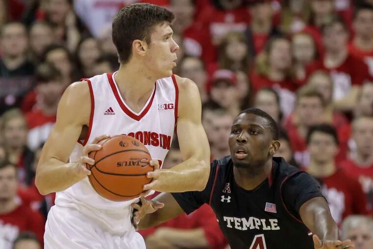 Temple's Dan Dingle guards Wisconsin's Ethan Happ. Dingle played 16 minutes.