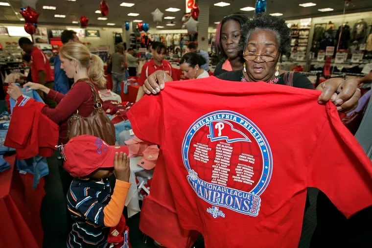 Ms. Ruth Davis of the Fox Chase section of Philadelphia stopped by the Modells sporting goods store in the Gallery at Market St. in October 16, 2008 to purchase Philadelphia Phillies Championship t-shirts.