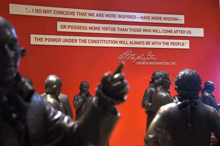 Statues of the Founding Fathers under the words of George Washington in Signers’ Hall at the National Constitution Center, reenacting the final day of the 1787 Constitutional Convention.
