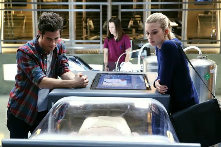 Emma Ishta hacks into minds of the recently dead to solve crimes, with Kyle Harris, in &quot;Stitchers.&quot; (Adam Taylor/ABC Family)