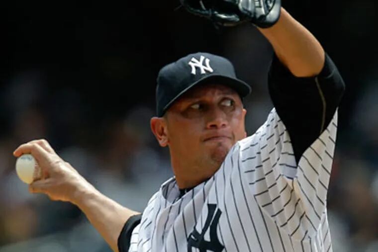 The Yankees' Danny Garcia became the first Venezuelan pitcher to reach 150 wins on Sunday. (Kathy Willens/AP)