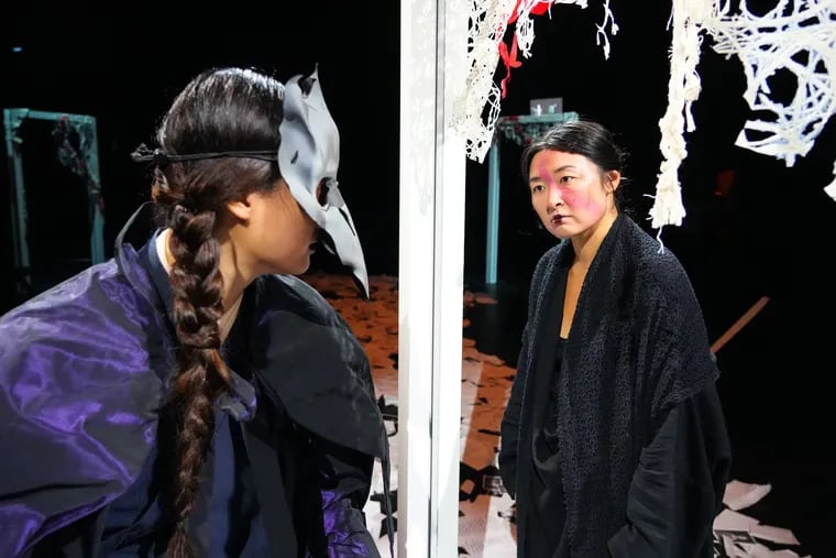 Dancer Muyu Ruba (left) is the Raven, with mezzo-soprano Kristen Choi, in Opera Philadelphia's production of Toshio Hosokawa's chamber opera "The Raven."