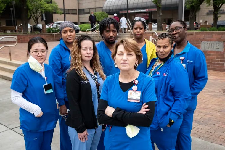 Mary Adamson (center), an ICU Nurse at Temple University Hospital, with other Temple nurses. Adamson wrote a piece about all of the nurses that remain in the profession.