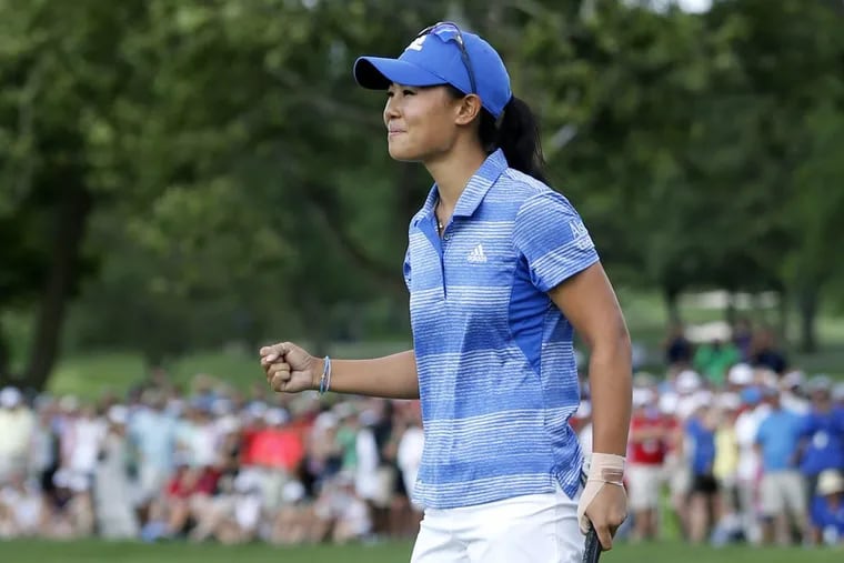 Danielle Kang reacts after making birdie on the 18th green to win the Women’s PGA Championship golf tournament at Olympia Fields Country Club Sunday, July 2, 2017, in Olympia Fields, Ill.