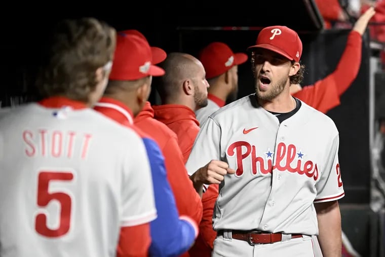 ST LOUIS, MISSOURI - OCTOBER 08: Aaron Nola #27 of the Philadelphia Phillies reacts in the dugout against the St. Louis Cardinals during the first inning in game two of the National League Wild Card Series at Busch Stadium on October 08, 2022 in St Louis, Missouri. (Photo by Joe Puetz/Getty Images)
