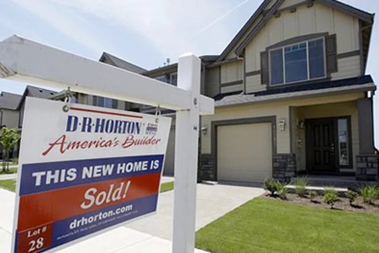 New homes are shown Wednesday, May 27, 2009, in Happy Valley, Ore. The Commerce Department said Thursday, that sales rose 0.3 percent in April to a seasonally adjusted annual rate of 352,000. (AP Photo/Rick Bowmer)