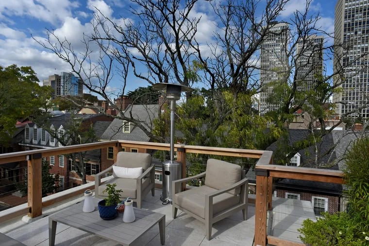 Rooftop deck, outdoor kitchen and modern touches turn historic