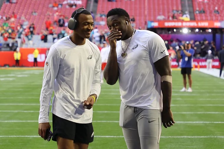 Eagles wide receivers DeVonta Smith (left) and A.J. Brown during warmups before Super Bowl LVII against the Kansas City Chiefs on Feb. 12.