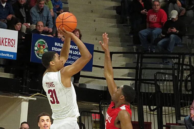 Harvard’s Seth Towns had 24 points and 12 rebounds in Saturday’s 74-55 win over Cornell in the Ivy League semifinals.