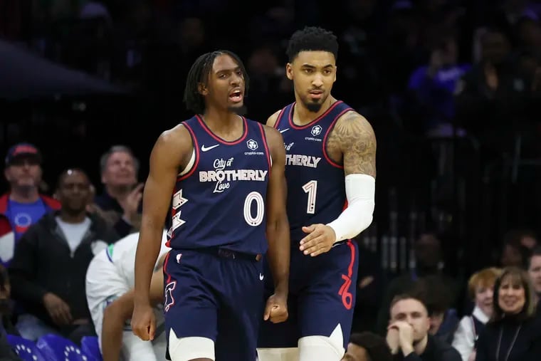 Philadelphia 76ers guard Tyrese Maxey celebrates with teammate KJ Martin during a game against the Minnesota Timberwolves at the Wells Fargo Center on Wednesday.