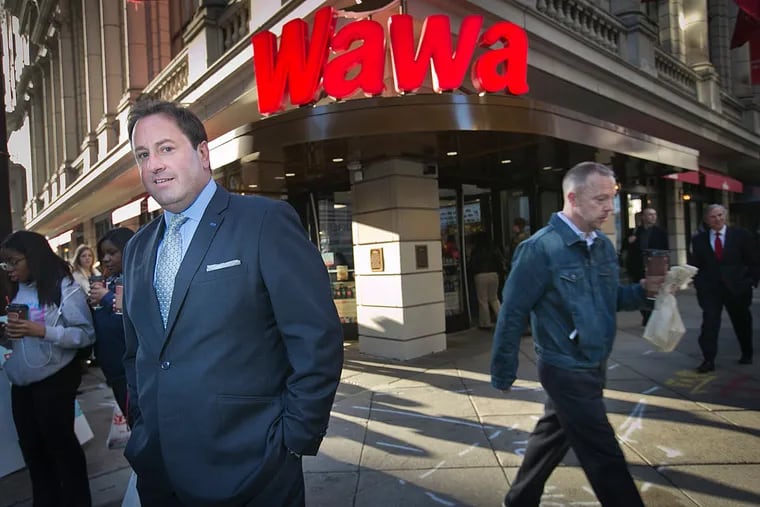 Chris Gheysens, CEO of Wawa, outside the location at South Broad and Walnut Streets on Wawa Day, which featured free coffee giveaways.