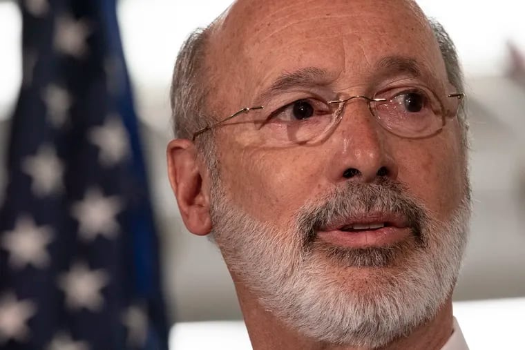 Gov. Tom Wolf at a news conference on lead contamination in Philadelphia schools in March
