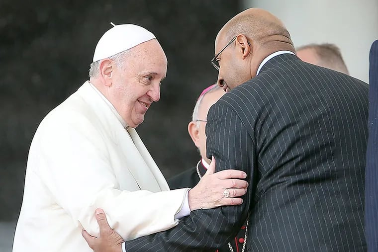 Mayor Nutter and Pope Francis embrace during the Papal Audience in St. Peter's Square.