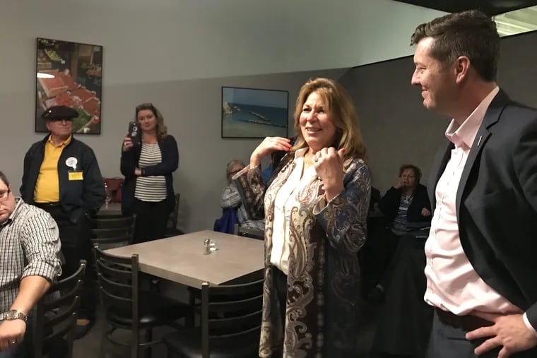 Bucks County Democrat Tina Davis stands with former U.S. Rep. Patrick Murphy in a Levittown restaurant, telling supporters that her bid for Republican incumbent Tommy Tomlinson's Pa. Senate seat was too close to call on Wednesday morning, Nov. 7, 2018.
