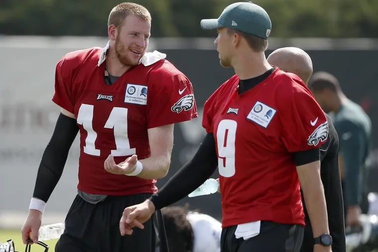 There is a lot to sort out when a team loses a starting QB such as Carson Wentz (left) late in the season, and someone like Nick Foles (right) has to step in.
