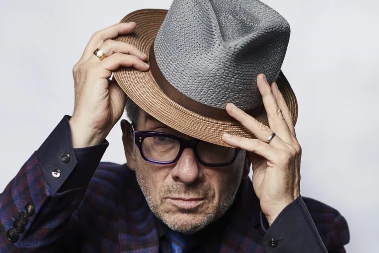 This Sept. 17, 2018 photo shows music legend Elvis Costello posing for a portrait at The Redbury New York hotel in New York to promote his latest release "Look Now."