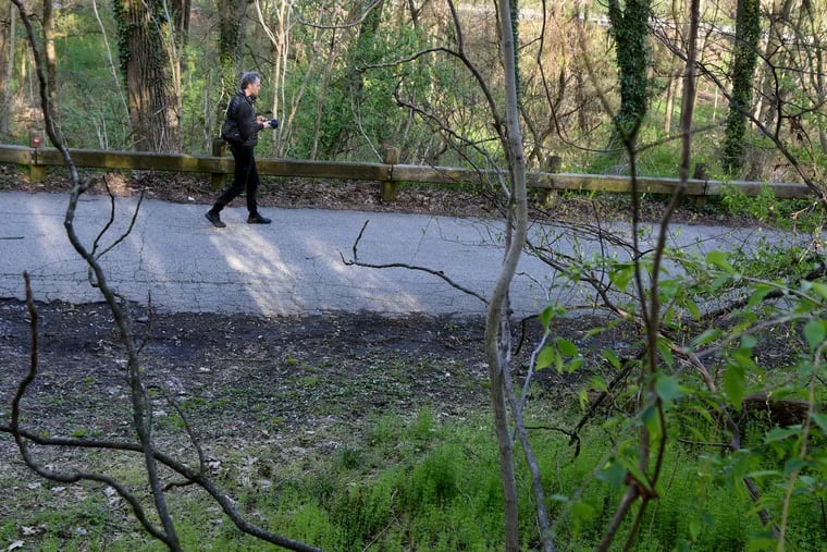 Musician and sound designer Michael McDermott walks down to the Wissahickon Creek on April 9 to record the sounds of the wild.