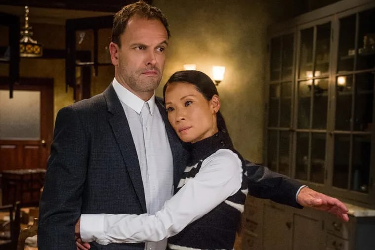 Jonny Lee Miller and Lucy Liu in the sixth-season premiere of CBS’ “Elementary,” in which their characters, Sherlock Holmes and Dr. Joan Watson, share an unusual moment
