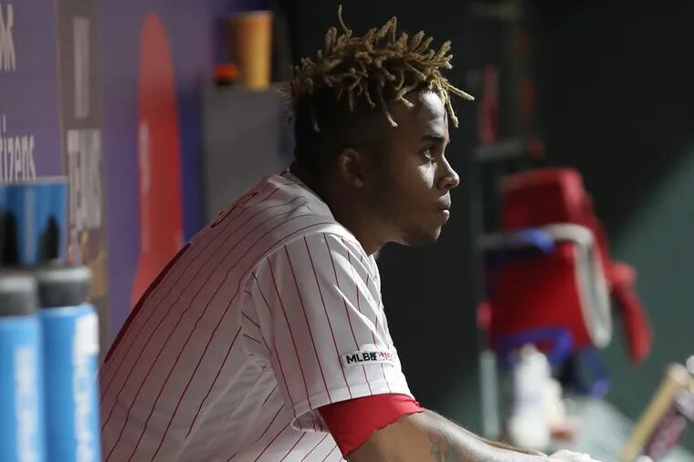 Edubray Ramos of the Phillies sits in the dugout after giving up a tying home run in the 9th inning against the Nationals at Citizens Bank Park on April 9, 2019.