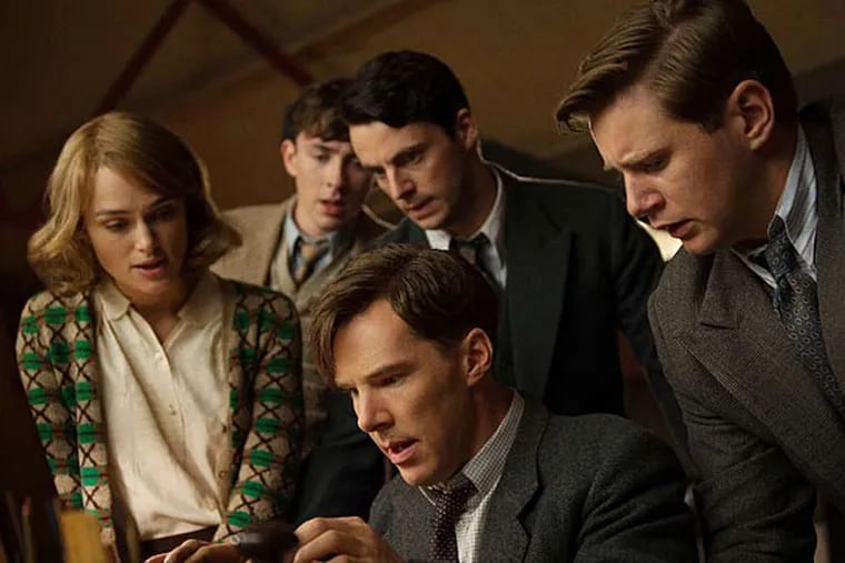 Cracking the code: (from left) Keira Knightley, Matthew Beard, Matthew Goode, Benedict Cumberbatch (seated), and Allen Leech in &quot;The Imitation Game,&quot; about Alan Turing (Cumberbatch) who helped win World War II but was persecuted for being gay.
