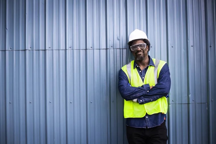 "United Shades of America" host W. Kamau Bell, dressed for a visit to the Covanta incineration plant in Chester, in Sunday's episode the CNN documentary series, "Toxic America," which looks at environmental issues in Philadelphia and Chester.