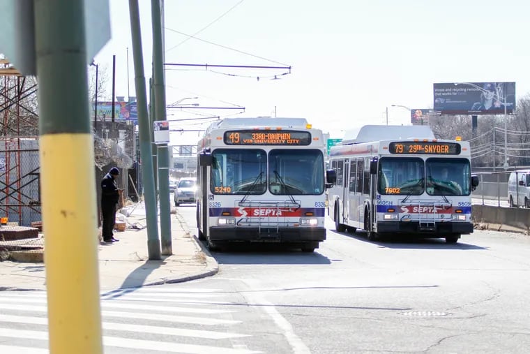 Bus 49 waits at its starting stop, Snyder Avenue and Vare Street in Southwest Philadelphia, The new route started on Sunday, so Monday was weekday for public transit commuters.