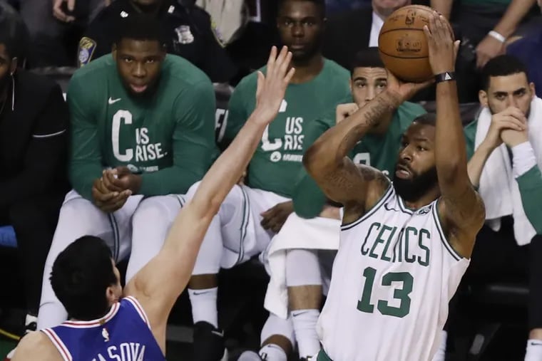 Boston Celtics forward Marcus Morris shoots over Philadelphia 76ers forward Ersan Ilyasova during Game 2 of their NBA playoffs series in Boston.