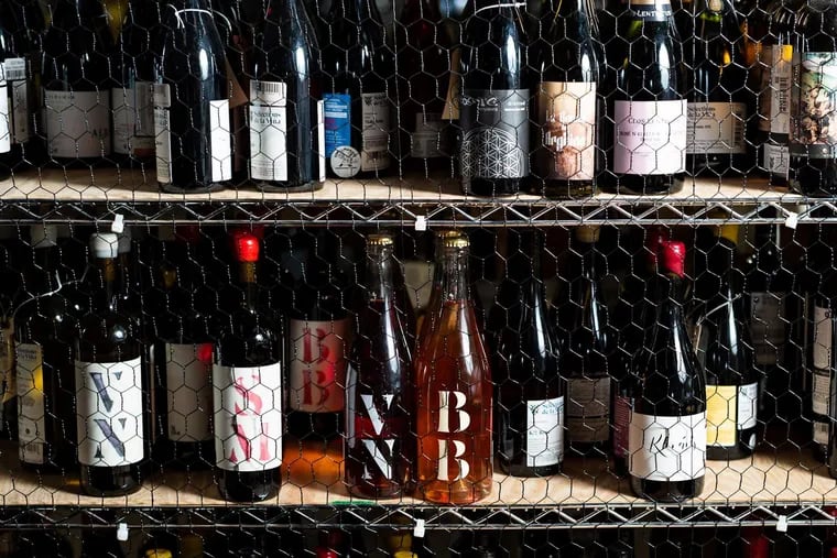 Wine retailers like 320 Market Cafe in Swarthmore have not been able to restock their shelves with their preferred wines since the Wolf administration closed the state stores last month. Shown here back view of a wine shelf at the store at 713. S. Chester Rd.