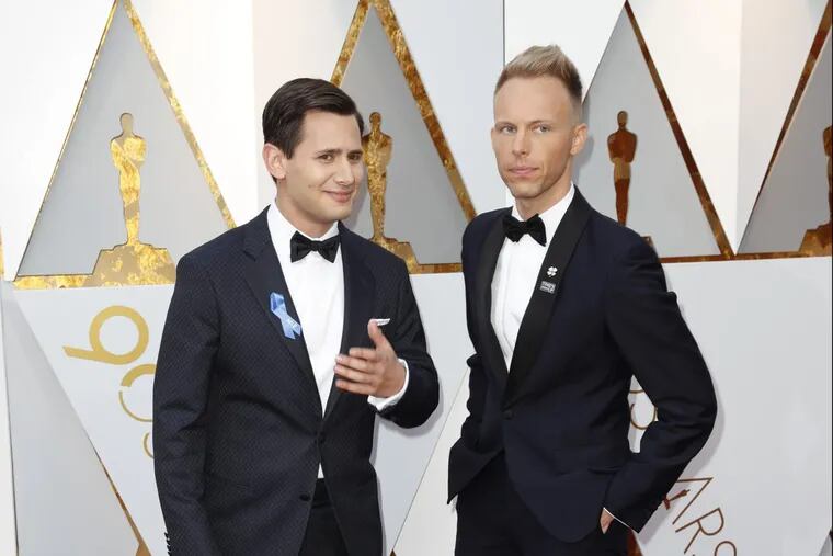 Benj Pasek and Justin Paul arrive at the 90th Academy Awards on Sunday, March 4, 2018, at the Dolby Theatre at Hollywood &amp; Highland Center in Hollywood.
