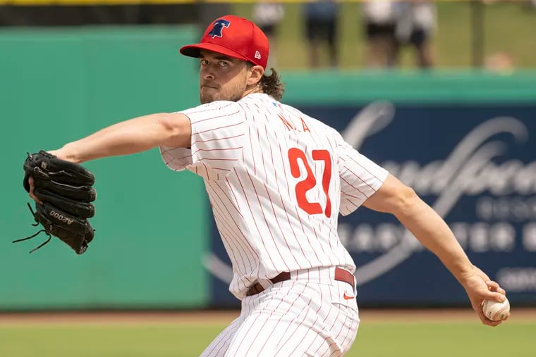 Phillies starter Aaron Nola allowed seven hits and four earned runs in three innings against the Marlins in a split-squad game on Friday in Clearwater, Fla.