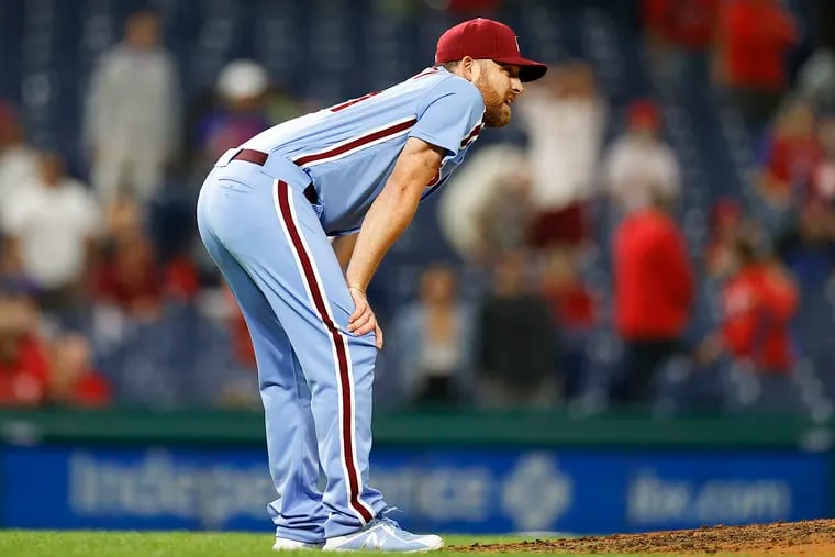 Phillies reliever Ian Kennedy reacts after allowing a two-out, two-strike home run to Colorado's Ryan McMahon in the ninth inning.