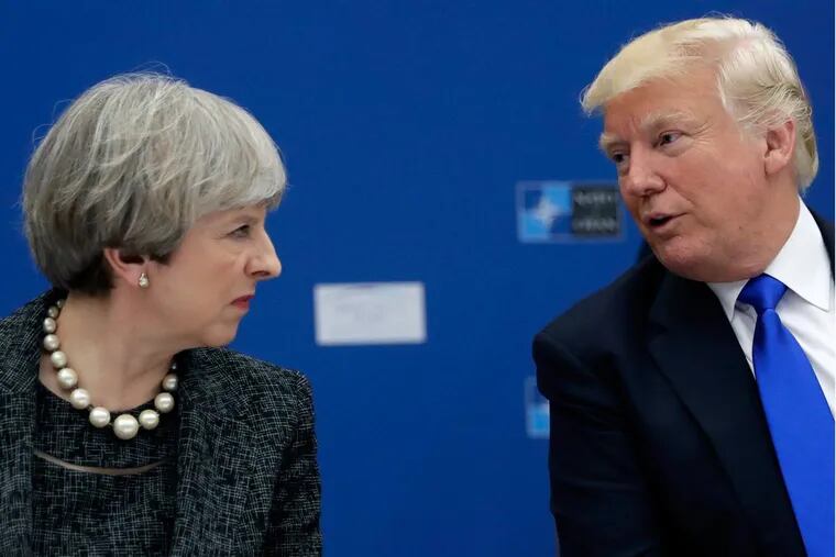 President Trump speaking to British Prime Minister Theresa May during a working dinner meeting at the NATO headquarters on May 25, 2017.