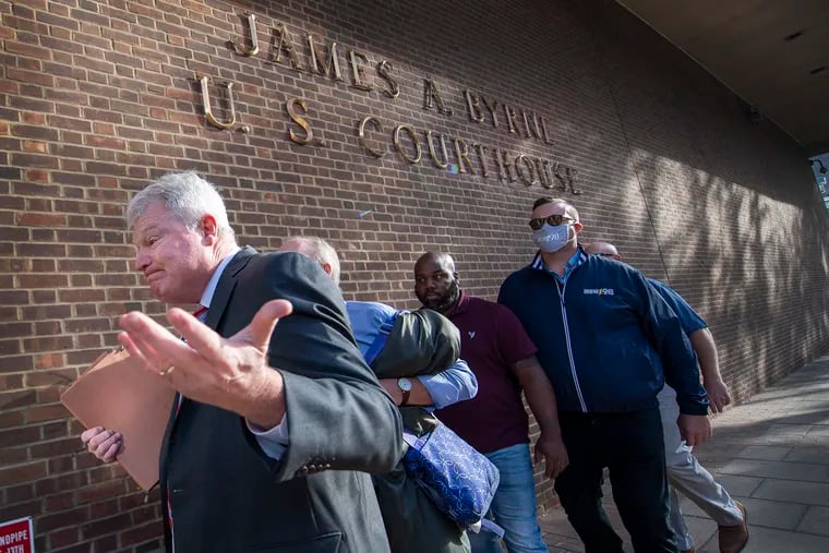 Labor leader John Dougherty arrives at the federal courthouse in Center City on Friday for his federal bribery trial.