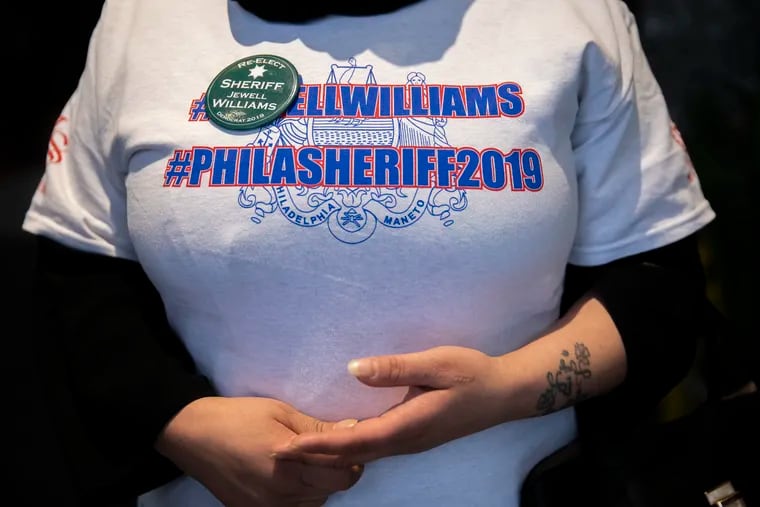 Taleah Taylor of the City of Dreams Coalition stands in the lobby of 100 South Broad in support of Philadelphia Sheriff Jewell Williams on Friday, April 05, 2019. Philadelphia's Democratic City Committee revoked their endorsement of Williams for reelection after three sexual-harassment complaints were made against him.