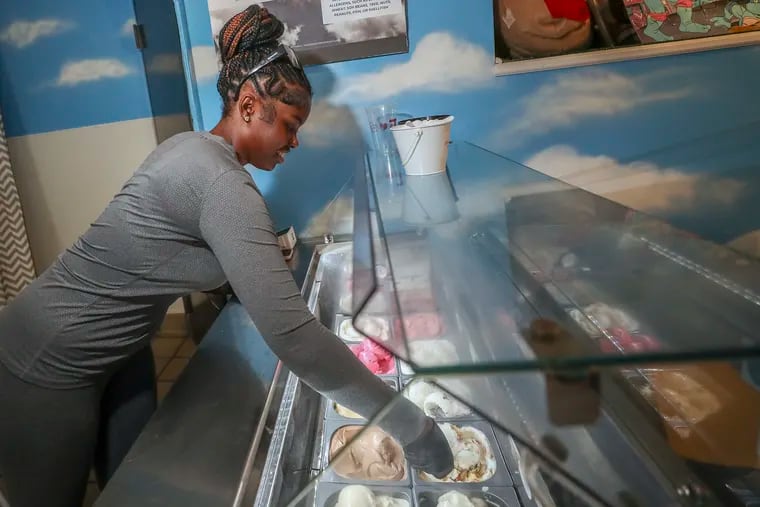 Madison McGill, 17, scoops a sample of birthday cake gelato at Cloud Cups in Philadelphia on Thursday, July 20, 2023.