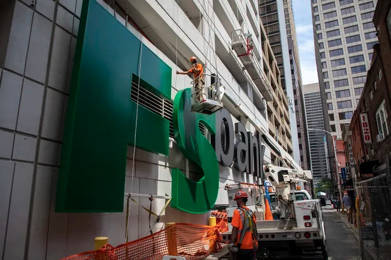 Eastern Sign Tech is in charge of putting up the WSFS Bank sign on top of the Beneficial Bank building at 1818 Market Street on Friday, August 2, 2019. It takes the workers about 6 hours to bring each individual piece up.