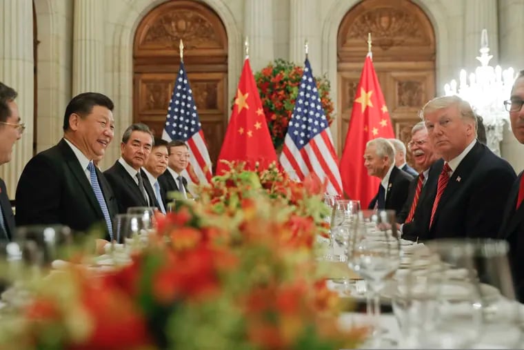 In this Dec. 1, 2018 file photo, President Trump, second from right, meets with China's President Xi Jinping, second from left, during their bilateral meeting at the G20 Summit, in Buenos Aires, Argentina. (AP Photo/Pablo Martinez Monsivais, File)