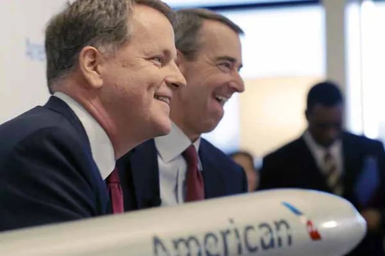 U.S. Airways CEO Doug Parker, left, and American Airlines CEO Tom Horton laugh during a news conference at DFW International Airport Thursday, Feb. 14, 2013, in Grapevine, Texas. The two airlines will merge forming the world's largest airlines.  (AP Photo/LM Otero)