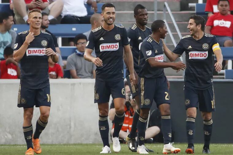 Haris Medunjanin had the opening goal and Cory Burke scored twice in the Philadelphia Union's 4-3 win at the Chicago Fire.