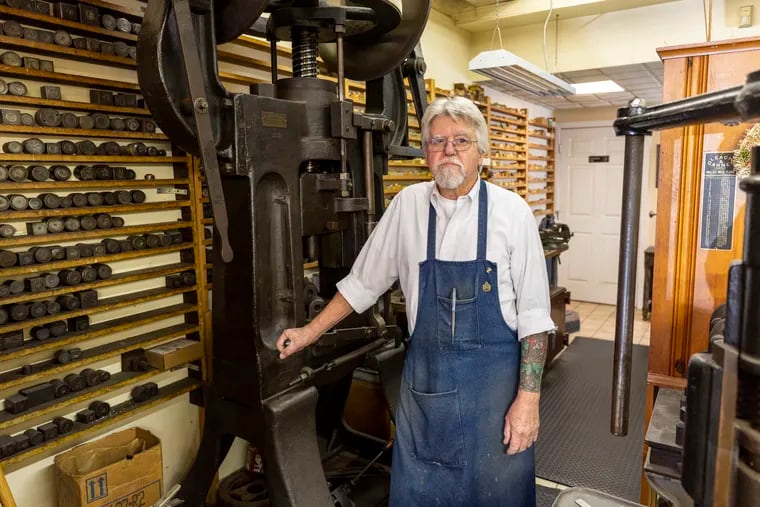 George Wise and a vintage press that's among the tools of his trade as a longtime jeweler in the heart of Haddon Heights. At 78, he takes a long view of Station Avenue, where he and his wife, Melinda, opened Wise Family Quality Jewelers in 1983.