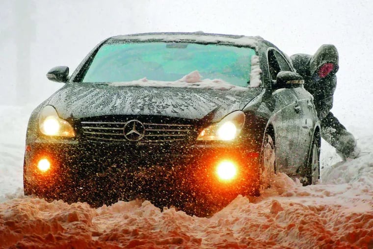 A Mercedes- Benz with rear- wheel drive wasn't dashing through the snow during a storm in Baltimore. KARL MERTON FERRON / Baltimore Sun