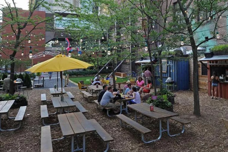 The Pennsylvania Horticultural Society's pop-up beer garden, with amphitheater seating built from shipping pallets, offers a spot to relax on South Broad Street in Center City.