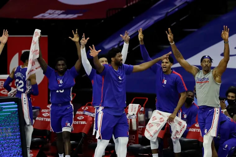 Sixers players' during Saturday's win over the Hornets.