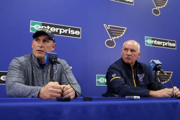 Craig Berube, left, speaks during a news conference along side St. Louis Blues general manager Doug Armstrong on Tuesday.  Berube was named the Blues' interim coach.