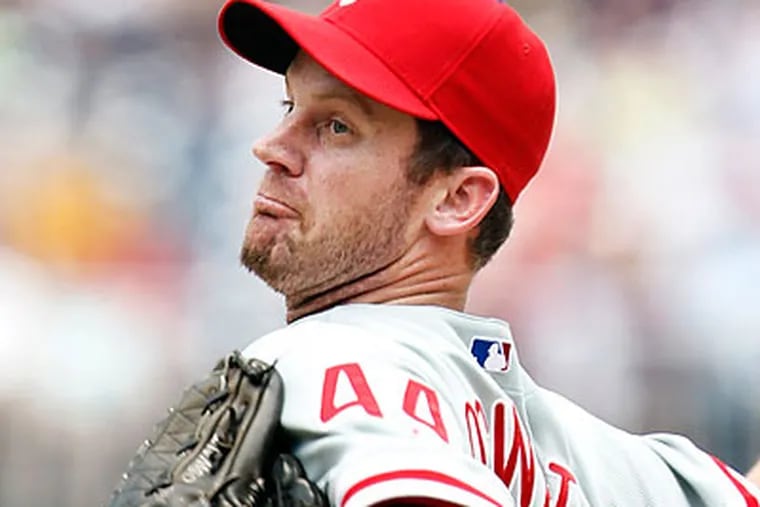 Roy Oswalt threw 79 pitches in five innings in his fourth start back from a long layoff. (Manuel Balce Ceneta/AP)