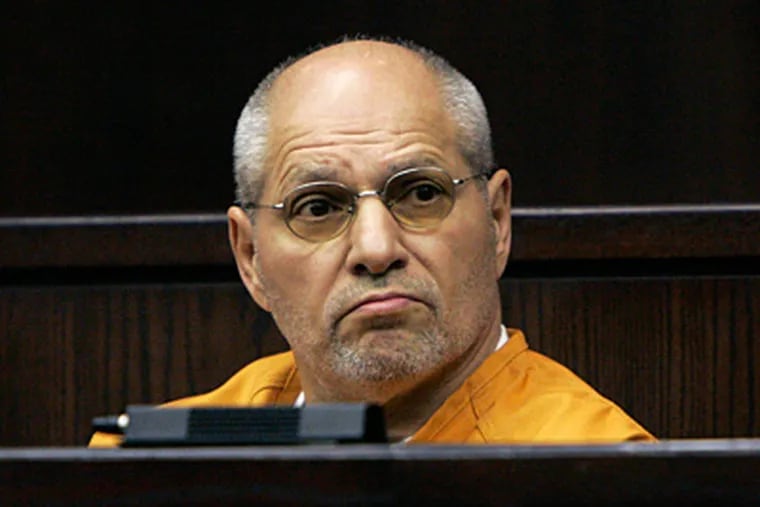 Michael Coppola, a reputed acting captain of the Genovese crime family, looks around the court in Somerville, N.J., in this March 2007 file photo. Coppola had eluded authorities since 1996. (AP Photo / Mike Derer, Pool)