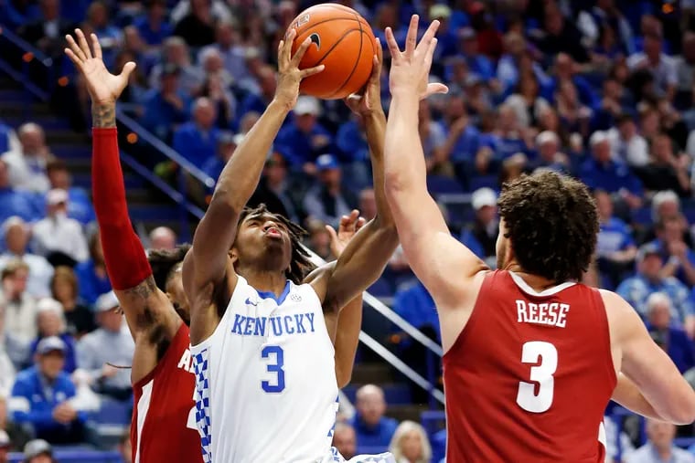 Kentucky's Tyrese Maxey (center) shooting against Alabama in January, is out to prove he can score from three-point range.