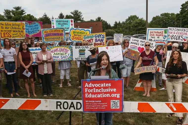 Student Lilly Freeman from Central Bucks East speaks at a rally as the Central Bucks School District is poised to vote on a library policy which targets books with "sexualized content."